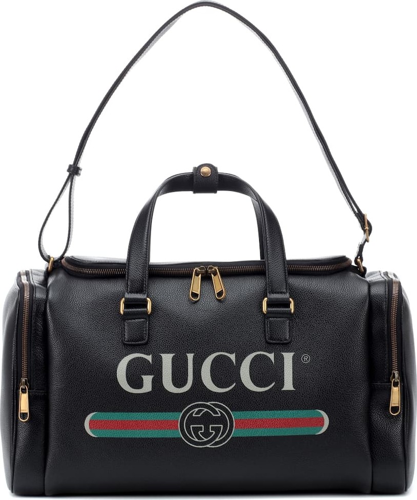 Gucci Gucci Print leather travel bag